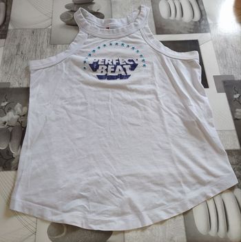 Haut levis taille 36.