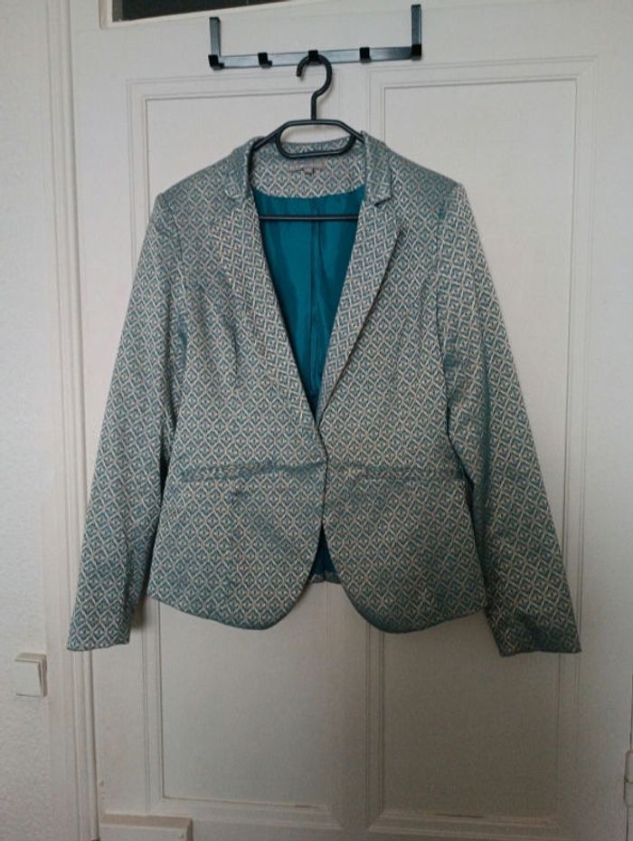 Veste bleu et dorée