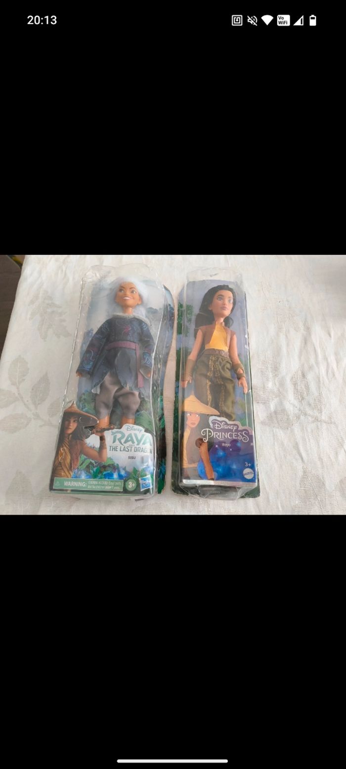 Lot poupées disney ( neuf) - photo numéro 1