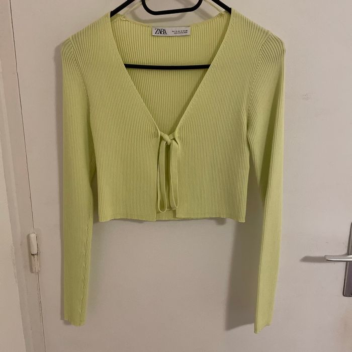 Gillet en maille avec noeud