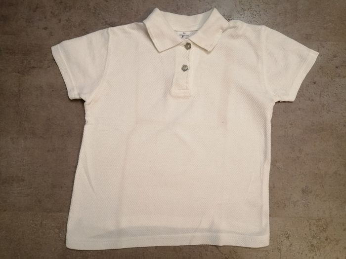 Polo manches courtes blanc nid d'abeille Taille 6 ans courtes blanc nid d'abeille Taille 6 ans