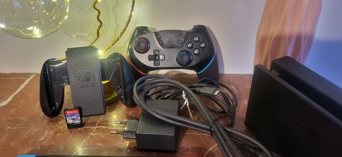 Console Nintendo Switch comme neuve + 1 jeu - photo numéro 3