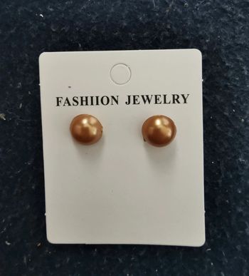 Puces d'oreilles nacrées