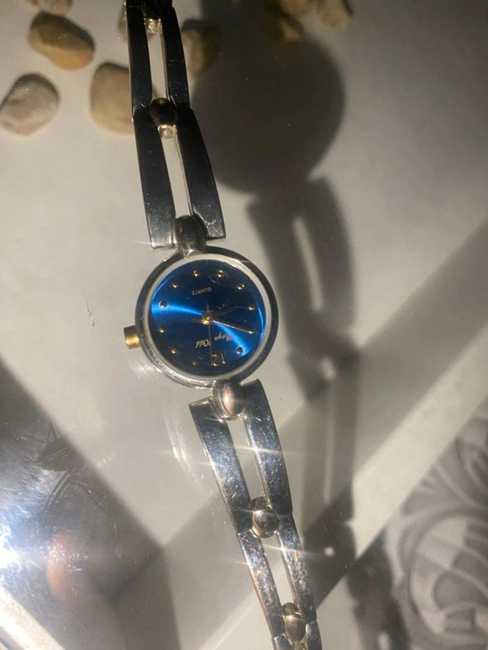 Montre grise cadran bleu - photo numéro 2