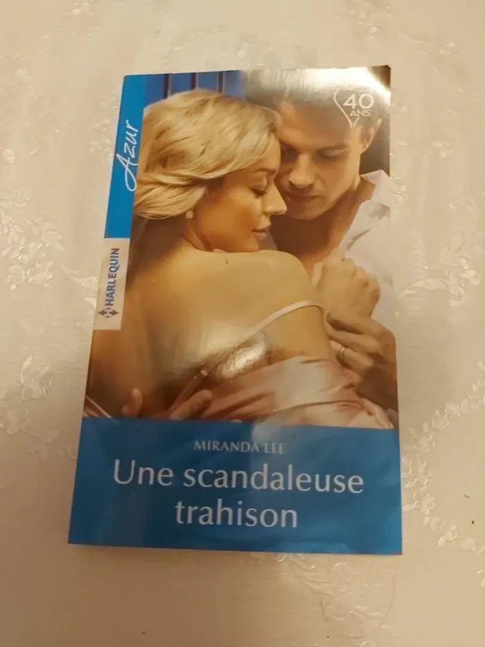 Livre Harlequin Une scandaleuse trahison