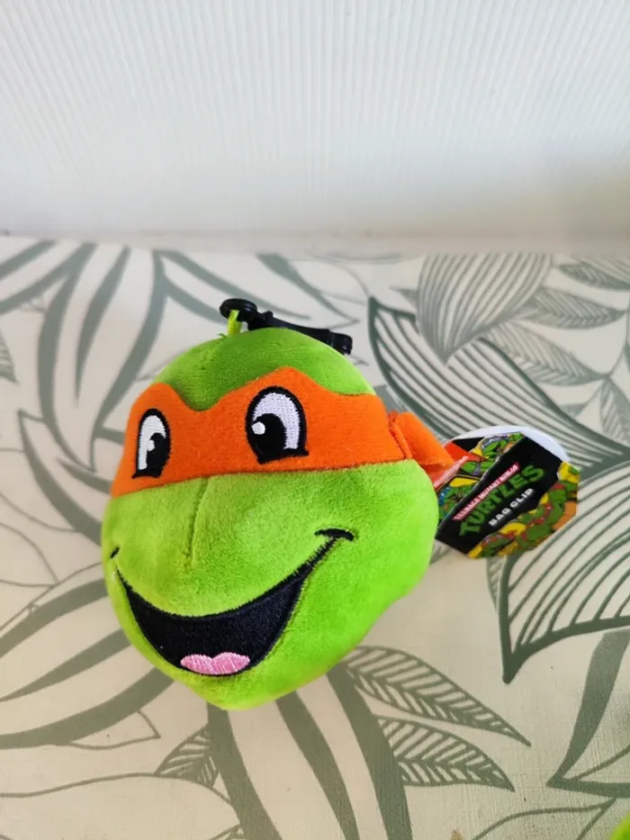 Porte clés peluche tête de tortue ninja orange 10cm