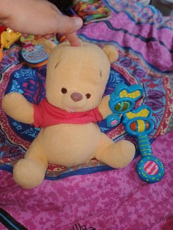 Winnie l'ourson et son hochet musical et animé