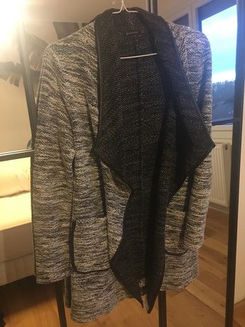 Gilet chaud long gris chiné stradivarius
