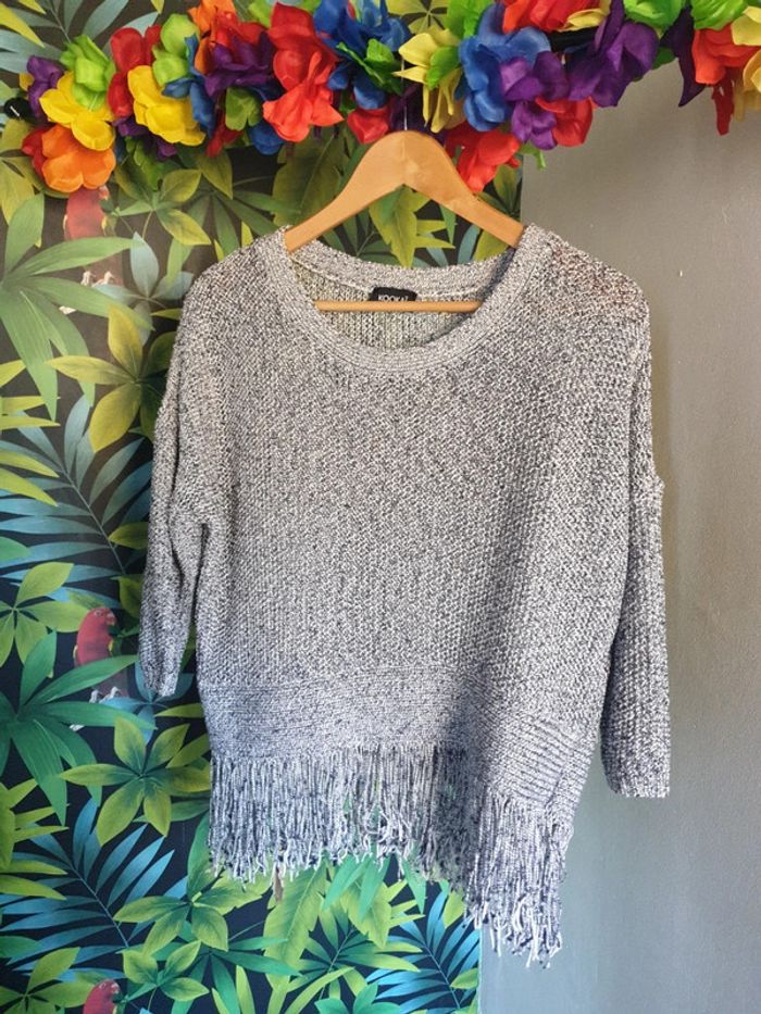Pull ajouré frangé