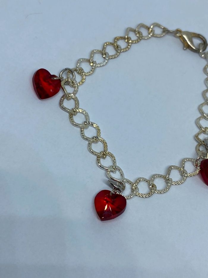 Bracelet fantaisie avec 3 coeurs rouge - photo numéro 5