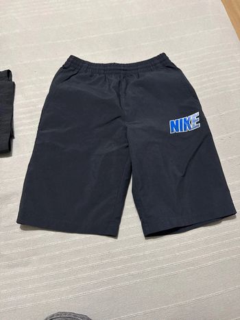 Short long taille L Nike, en excellent état