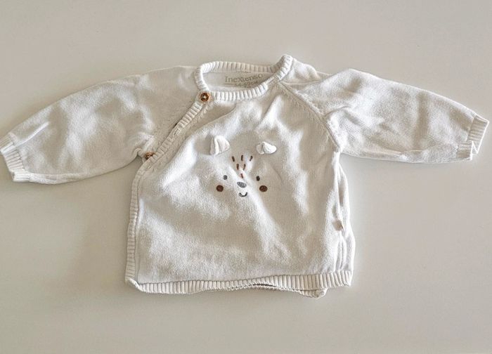 Gilet blanc taille 1 mois neuf