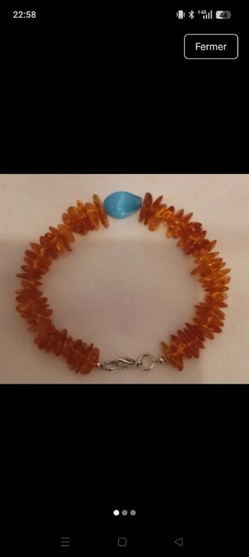 Bracelet ambre et oeil de chat bleu 