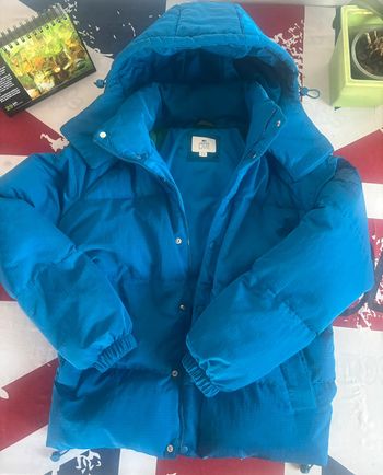 Doudoune Lacoste taille us: xs/ fr: 44 bleu à carreau