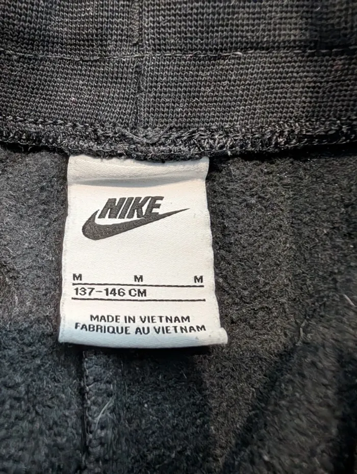 Très beau pantalon de jogging Nike noir mixte 9/11 ans - photo numéro 5