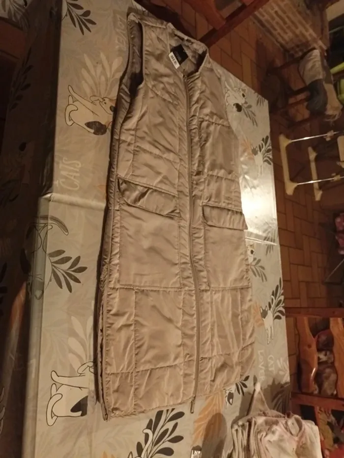 Doudoune longue manches courtes neuves