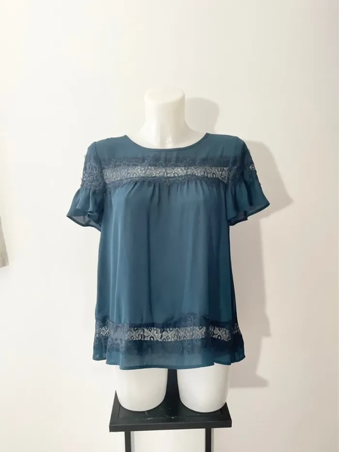 Blouse bleue canard