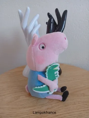 Peluche Peppa pig George pig avec son Dinausore
