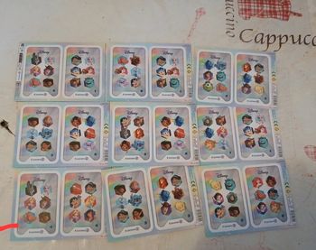 9 pochettes de 4 cartes Disney