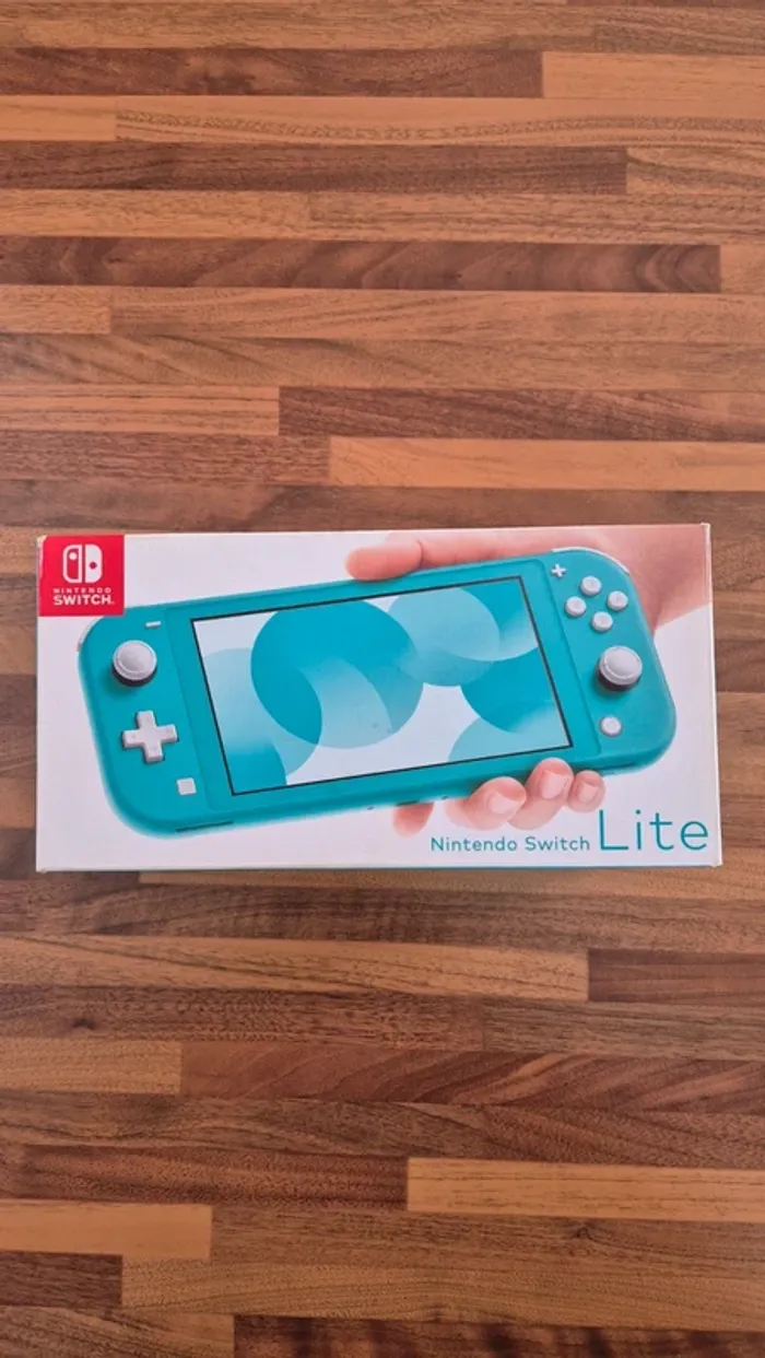 Console Nintendo switch lite "Bleu turquoise " en boîte - photo numéro 5
