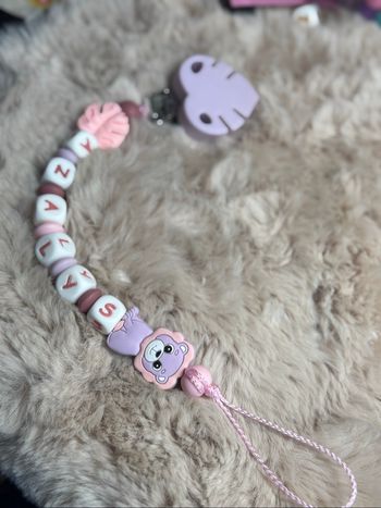 Attache tétine lion