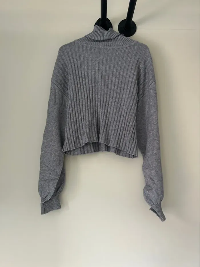 Pull col roulé