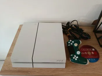 PS4 blanche avec manette officielle et 1 jeu