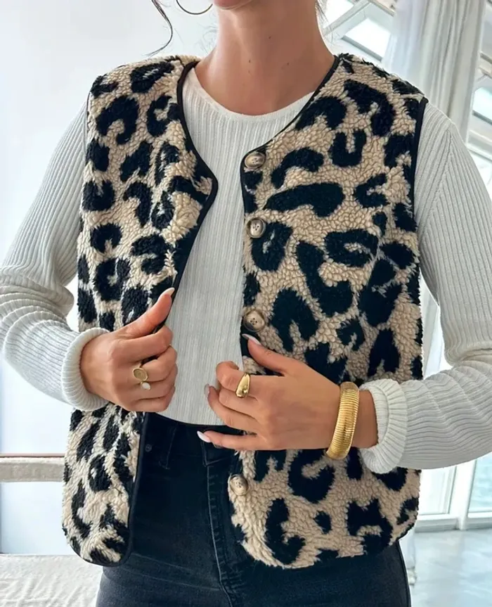 Veste sans manches , léopard , taille M , neuve