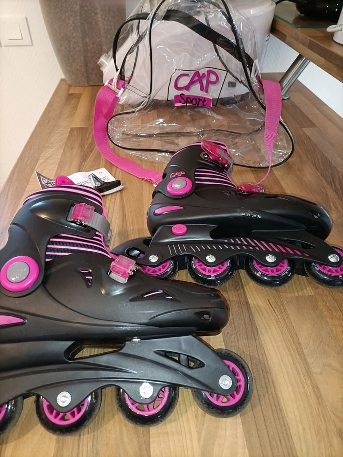 Roller noir et rose 33 à 36 cap loisirs + sacoche de rangement
