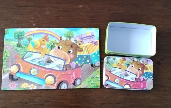 Puzzle de 60 pièces ,vache en voiture avec un coq