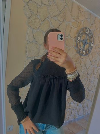 Blouse à volant noir femme