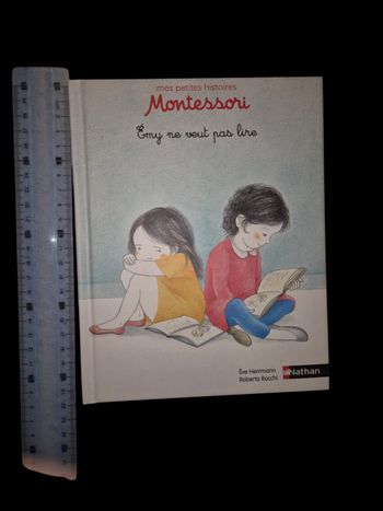 Livre montessori Emy ne veut pas lire 