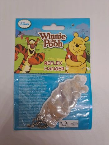 Porte-clés réfléchissant, "Winnie l'ourson".
3,5x8cm.
NEUF.