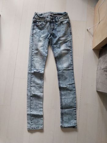 Jean femme bleu clair effet troué