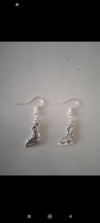 Boucle d'oreille patin