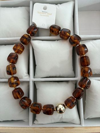 Collier grosses perles marrons acier inoxydable 