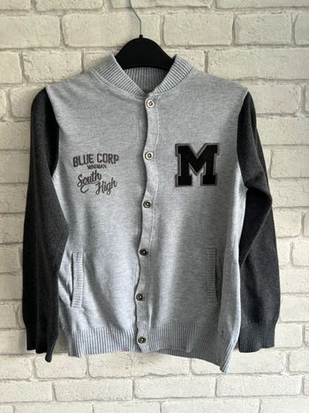 Gilet miniman taille 10 ans