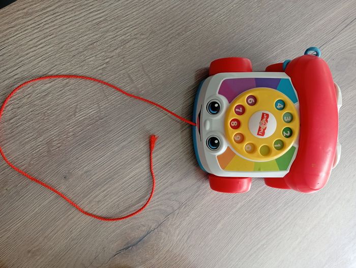 Lot Jeux divers (5 puzzle bois, téléphone Fisher Price, Sophie la girafe, manette fisherprice, lego) - photo numéro 4