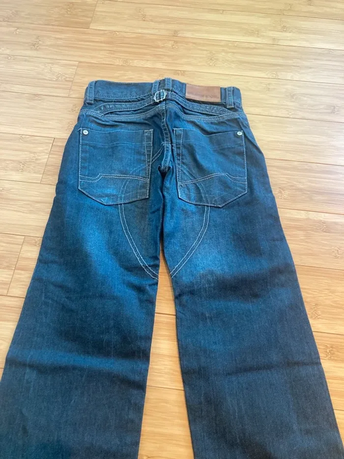 8 ans - Pantalon en jeans super état - photo numéro 3