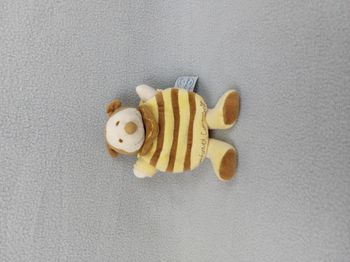 DOUDOU ET COMPAGNIE abeille Ponpon jaune beige rayures marron 18 cm