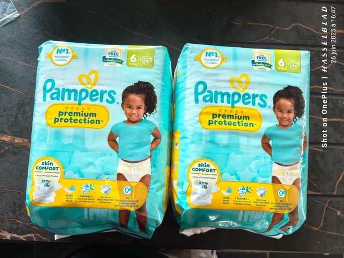 Deux petits paquets Pampers premium protection t.6
