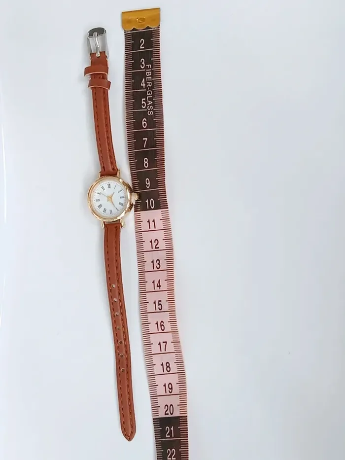 Montre vintage chic dorée bracelet marron à chiffres romains Neuf - photo numéro 5