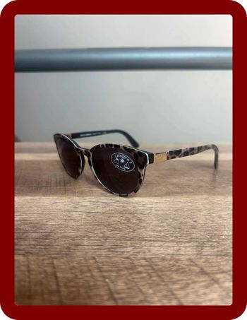 Lunette de soleil Dolce&Gabanna logo doré et motif jaguar/panthère