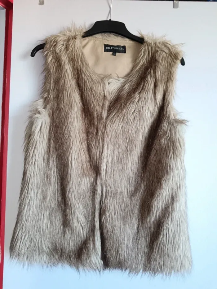 Veste sans manche femme fausse fourrure Taille L 40/42