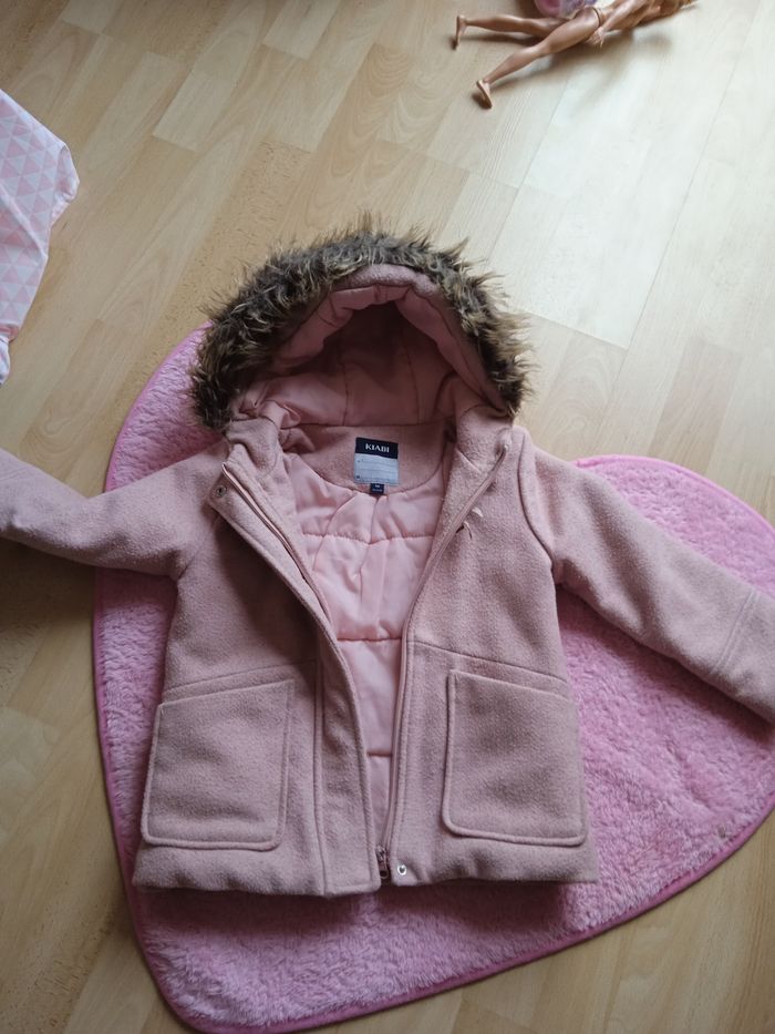 Manteau capuche fourrure