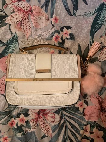 Sac à main blanc à pompons