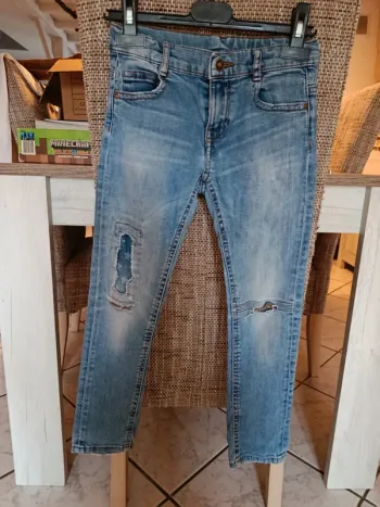 Jean garçon tape à l'oeil