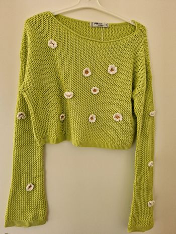 Pull court taille M.