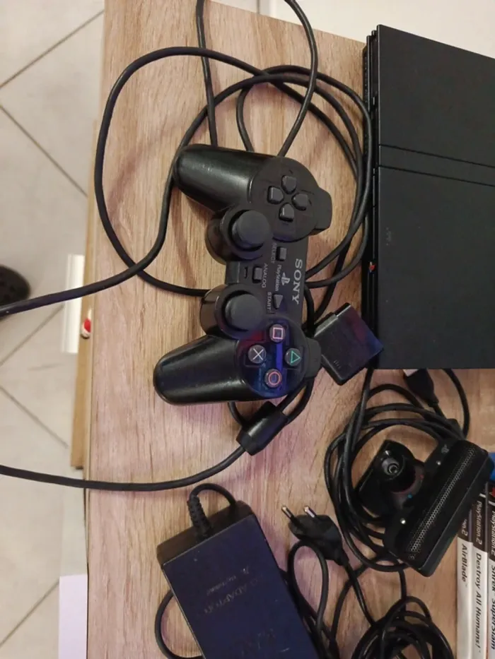 Lot ps2 avec 15 jeux manette câbles et caméra - photo numéro 3