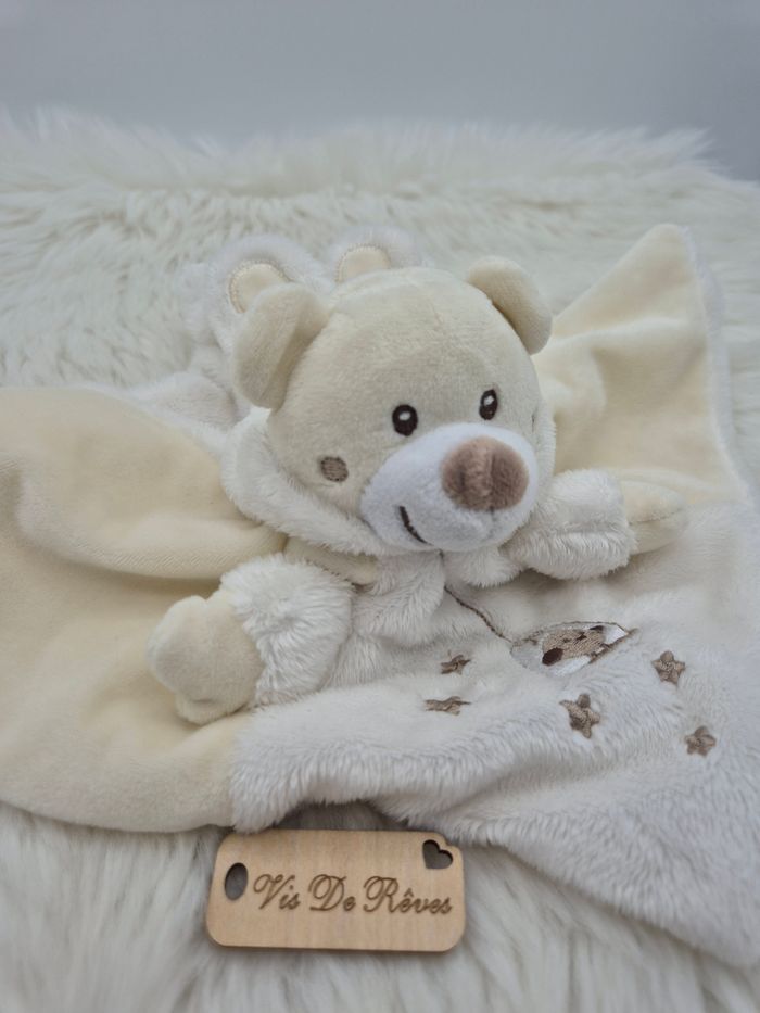 Doudou plat Ours déguisé lapin blanc
crème oiseau Gémo - photo numéro 2